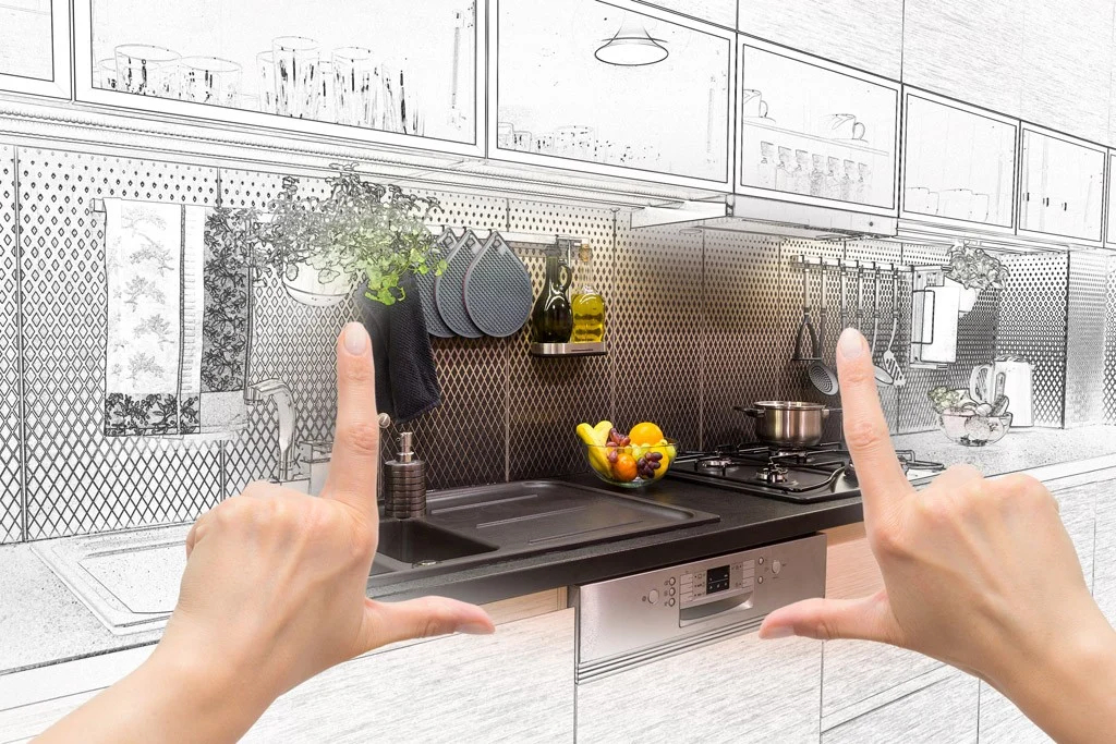 POV of a person using their hands to imagine a kitchen transitioning from blueprint to reality.